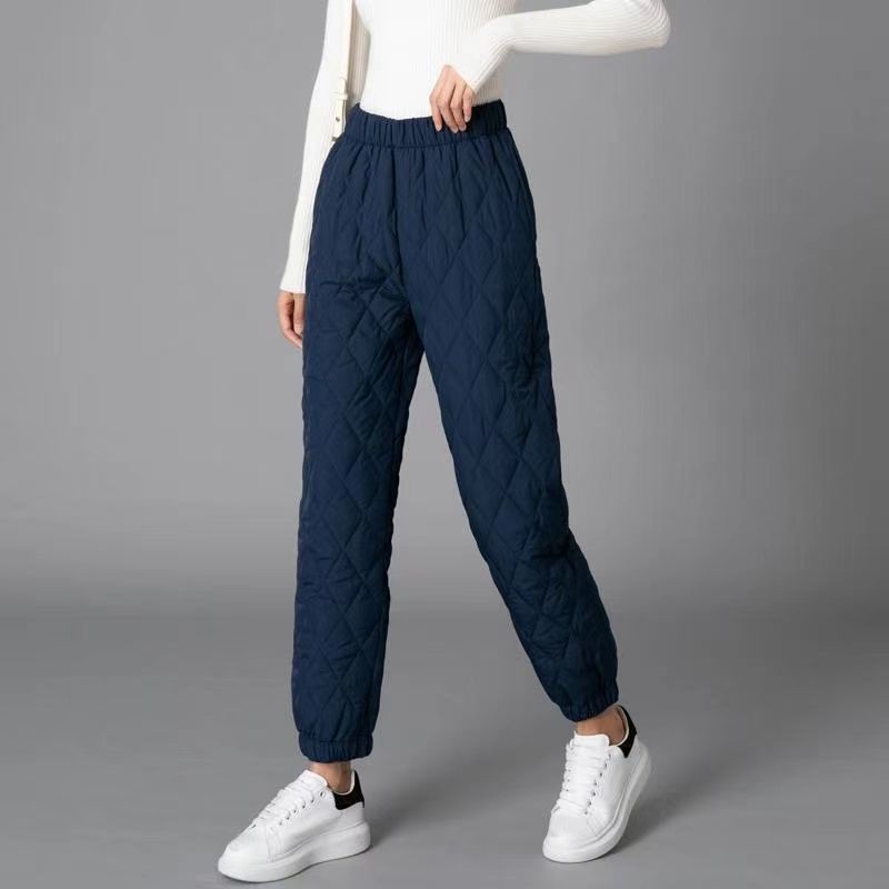 Warm women's quilted jogger pants, diamond stitch, ideal fall/winter casual wear.