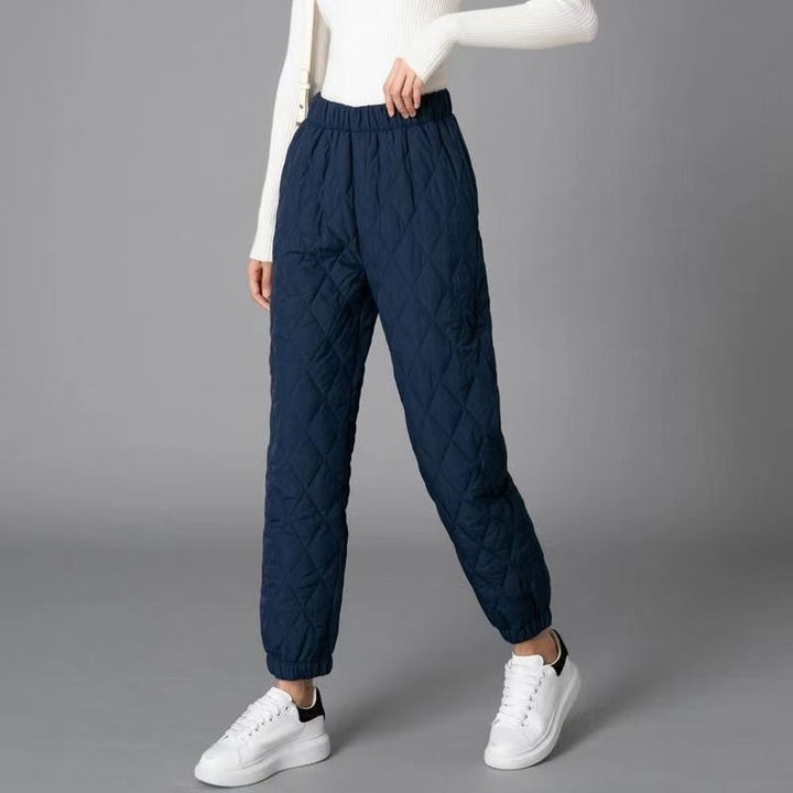 Warm women's quilted jogger pants, diamond stitch, ideal fall/winter casual wear.