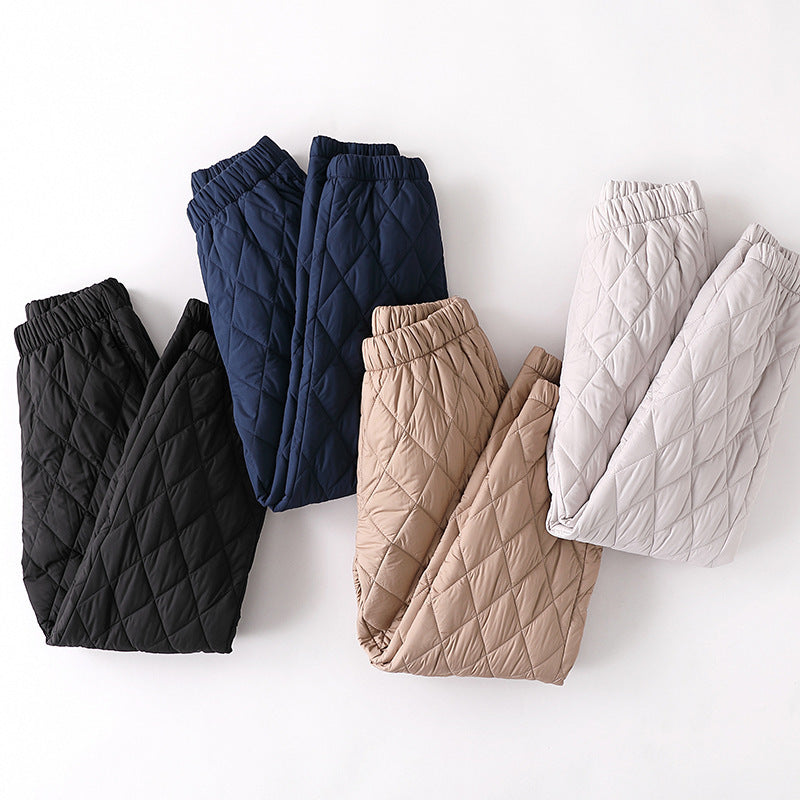 Soft women's quilted jogger pants featuring a chic diamond stitch pattern for comfort.