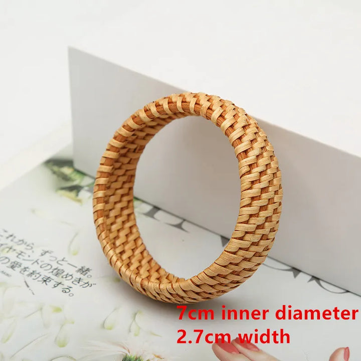 Elegant women's rattan woven bracelet set, stylish and lightweight natural jewelry.