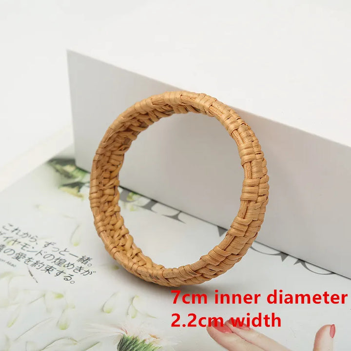 Intricately woven rattan bangles, a beautiful natural and elegant accessory for women.