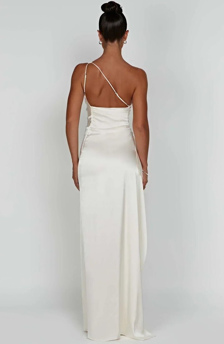 Red Selene evening gown, luxurious pleated satin, with an elegant unique shoulder.