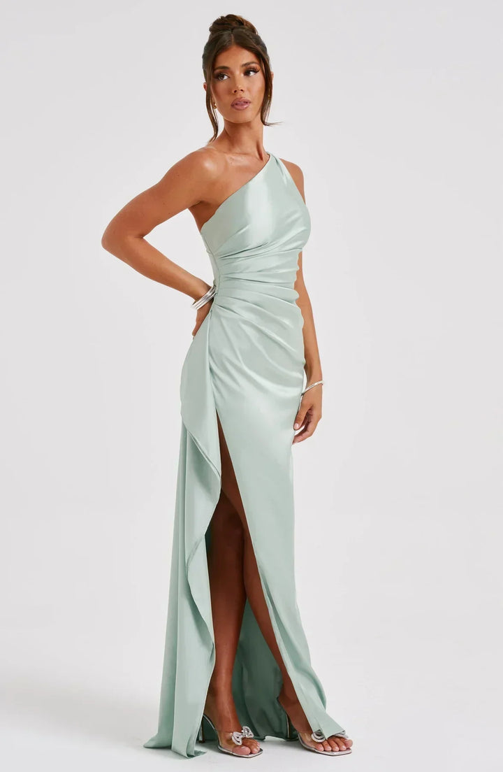 Black special occasion pleated dress, unique shoulder detail for a flattering look.