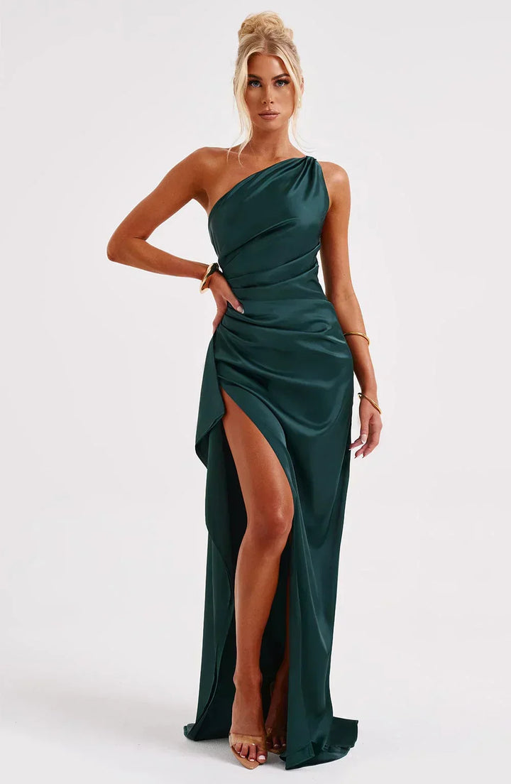 Red Selene special occasion dress, unique shoulder, and beautiful flowing pleats.