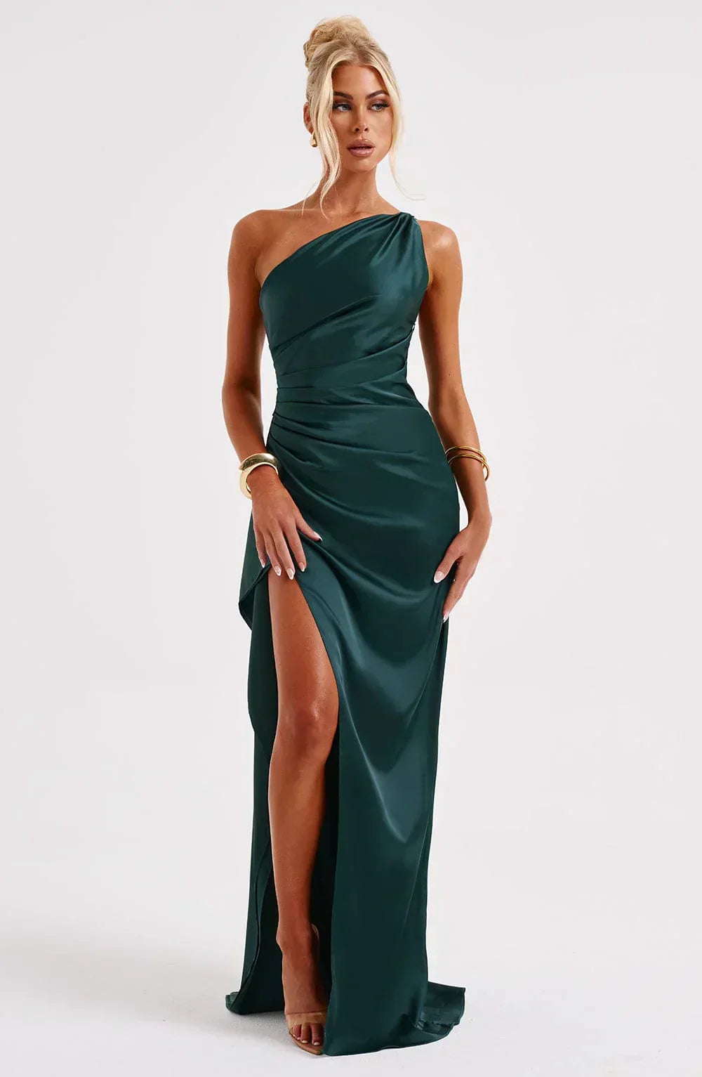 Black Selene formal dress, unique shoulder, and sophisticated pleated design.