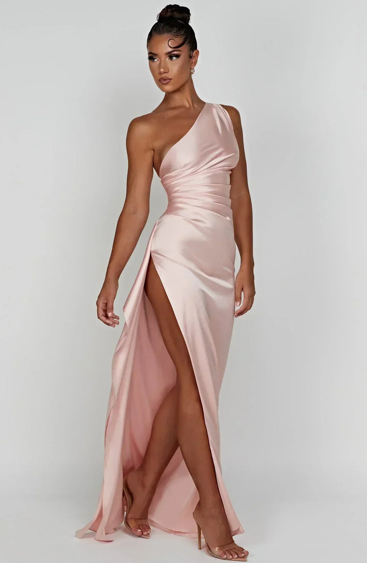 Sophisticated black pleated dress, Selene collection, perfect for special occasions.