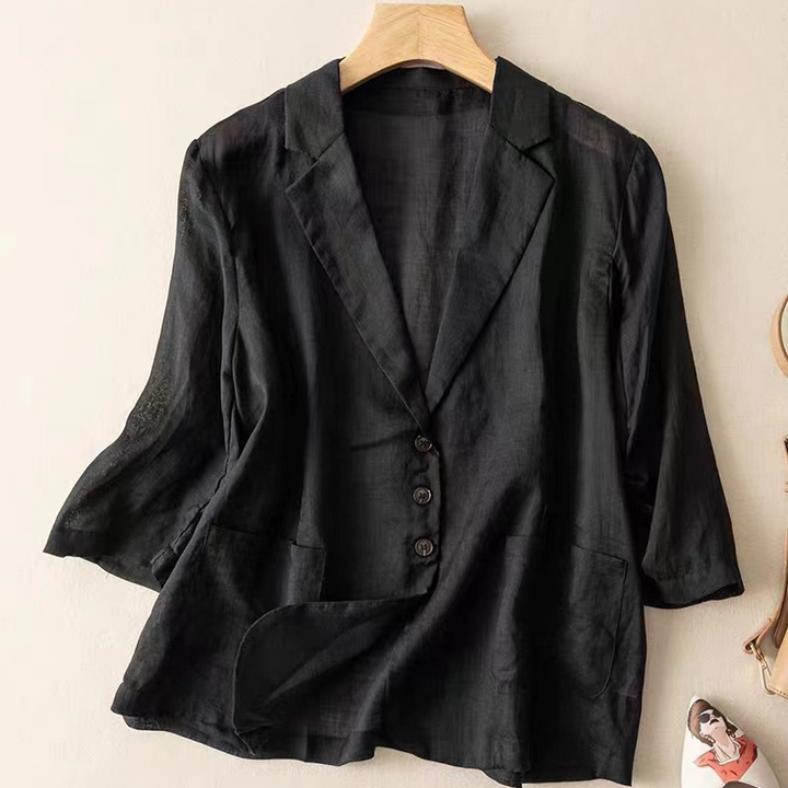Women's black relaxed fit blazer, a versatile outerwear piece for chic professional office attire or smart casual looks.
