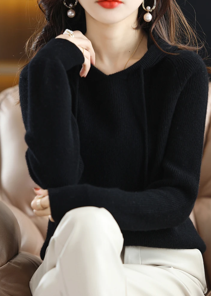 Comfortable women's ribbed knit pullover hoodie, chic design for fall/winter style.
