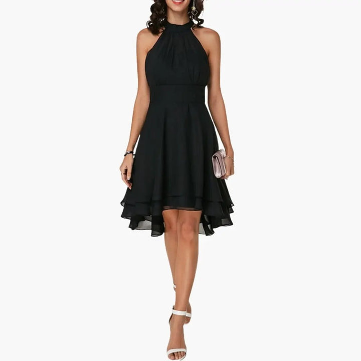 Women's elegant round neck sleeveless ruffle dress. Knee-length, versatile for casual or chic summer wear.