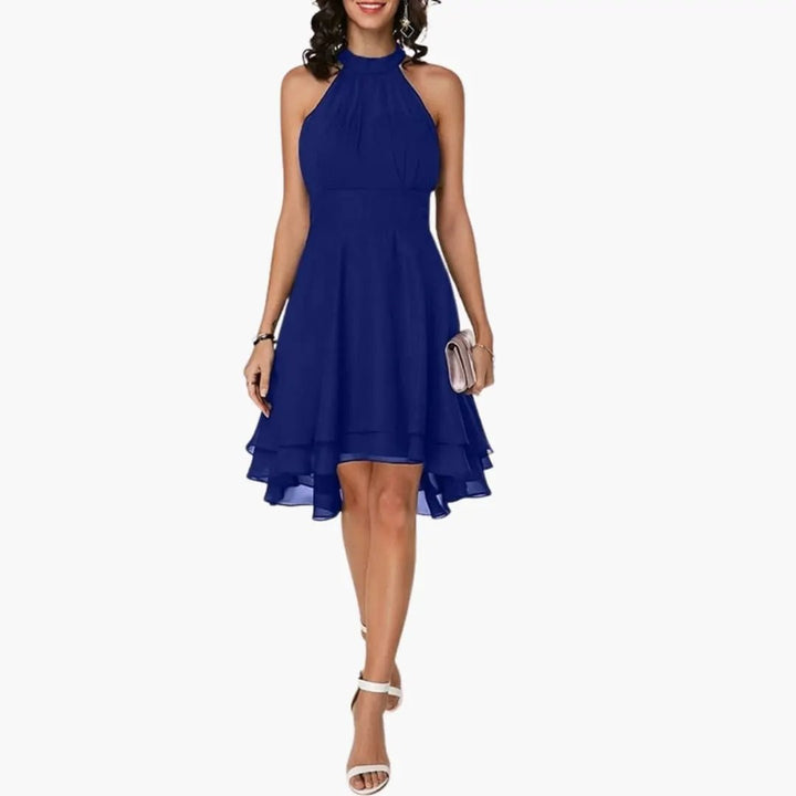 Chic women's sleeveless knee-length ruffle dress with a round neck. Perfect for elegant casual summer daywear.