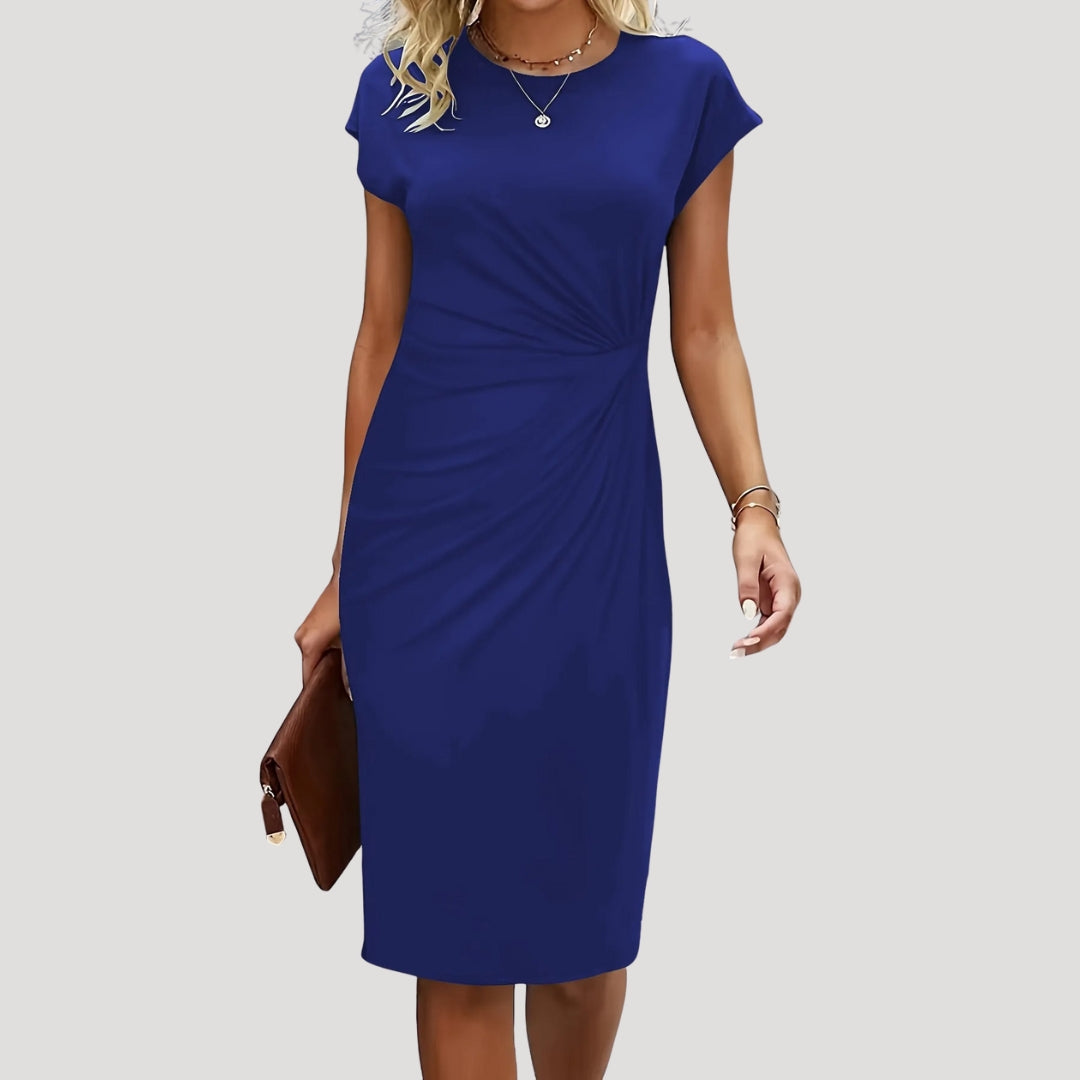 Fitted women's midi dress with chic ruched cap sleeves. Elegant and professional for business attire.