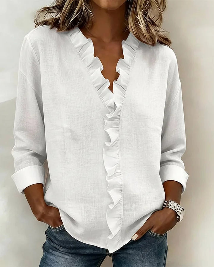 Pink ruffled V-neck long sleeve blouse for women, an elegant and casual fashion top.