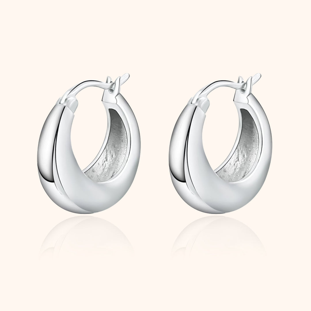 Pair of minimalist S925 silver & 18K gold plated hoop earrings, a versatile and timeless addition to women's jewelry.