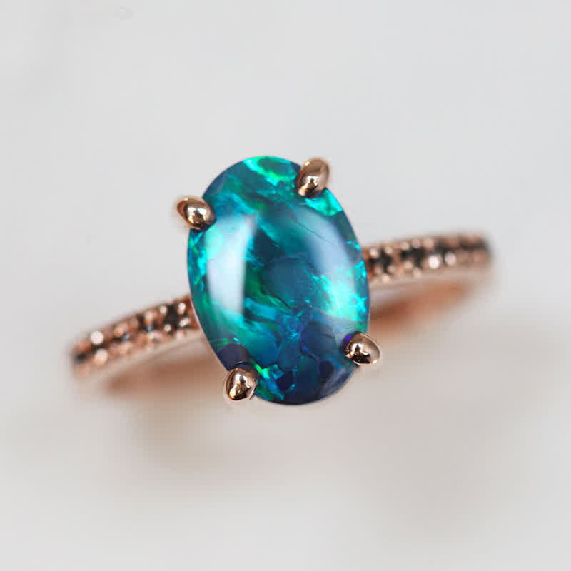 Women's sapphire & opal 3-piece ring set with precious metal. Elegant fine jewelry, gemstone ring.