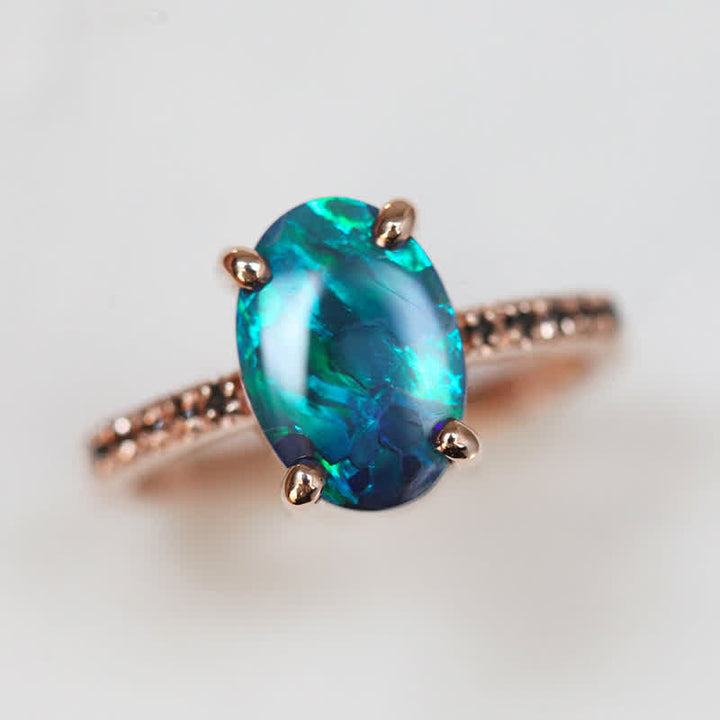 Women's sapphire & opal 3-piece ring set with precious metal. Elegant fine jewelry, gemstone ring.