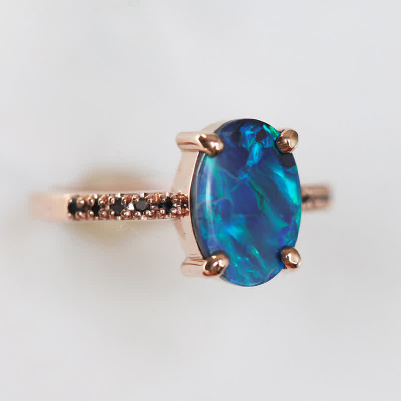 Versatile women's sapphire & opal 3-piece ring set. Stackable fine jewelry, elegant gemstone gift.