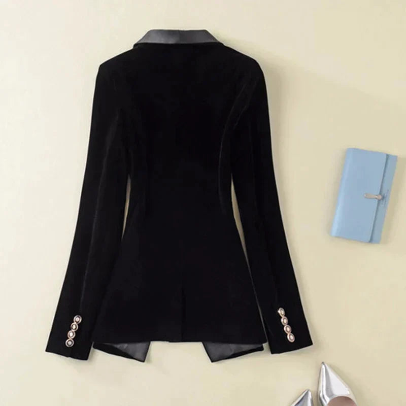 Sophisticated women's satin lapel tuxedo blazer. Chic formal outerwear for evening or professional settings.