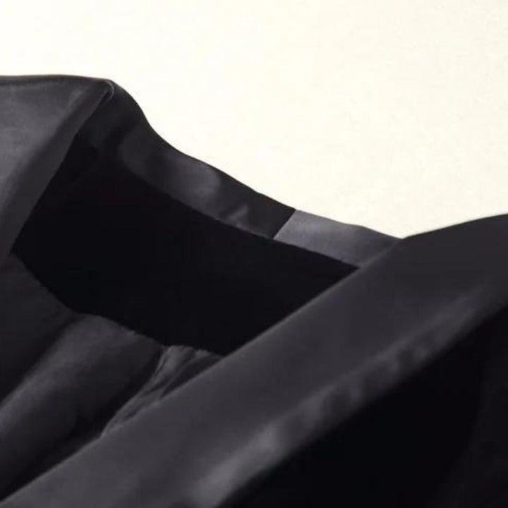 Versatile women's tuxedo blazer with satin lapel. Elegant jacket for formal, office, or chic casual style.