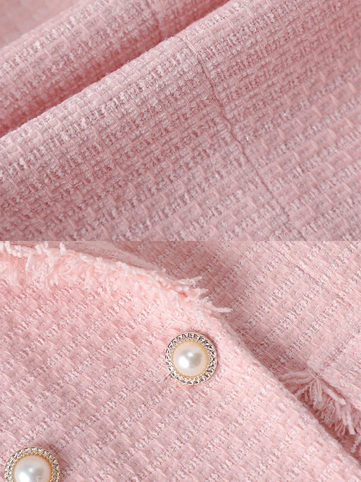 Women's stylish raw edge blazer with elegant pearl detailing. Sculpted fit tailored for a chic professional look.