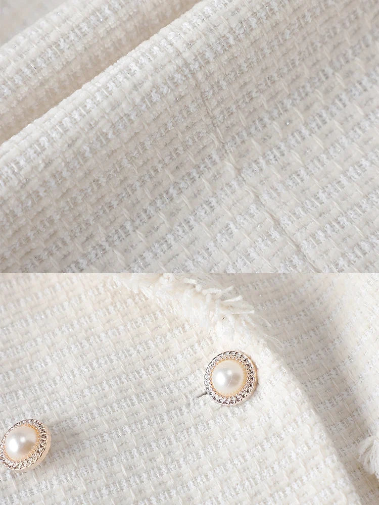 Elegant women's sculpted blazer with pearl details, offering a chic, tailored fit. Ideal for professional settings or special occasions.
