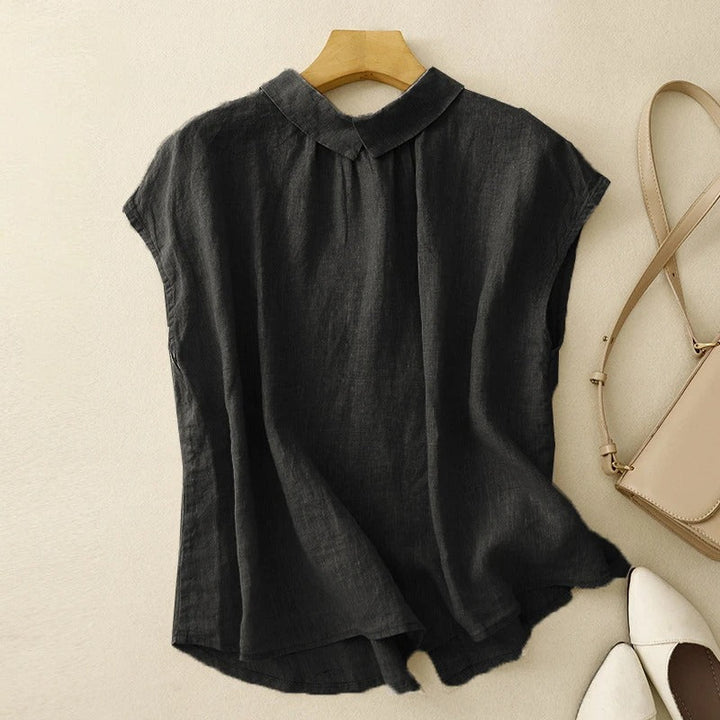 Women's elegant sculpted collar blouse with cap sleeves, ideal for sophisticated spring & summer style.