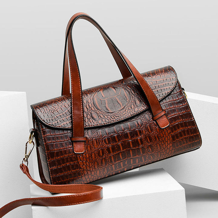 Women's elegant shoulder bag with chic crocodile embossing. Perfect everyday fashion accessory.