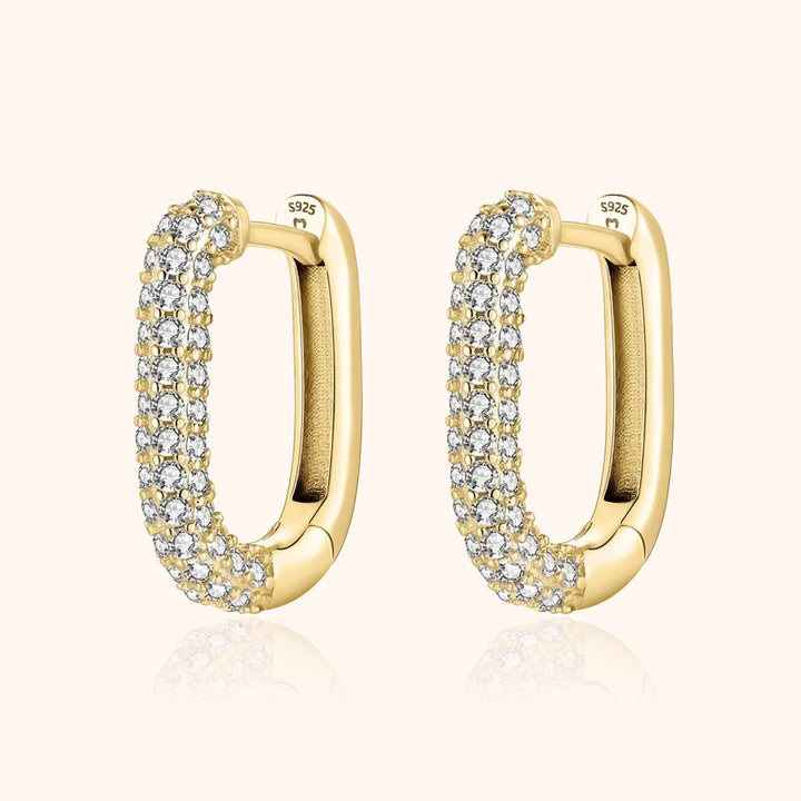 Lucienne women's radiant hoop earrings, crafted from silver & gold, adorned with shimmering zirconia for elegance.