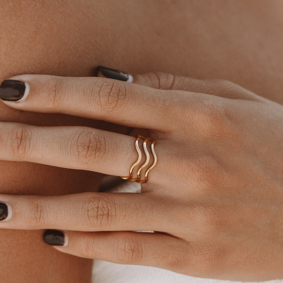 Women's elegant silver ocean wave ring, perfect for everyday wear & durable ocean jewelry.