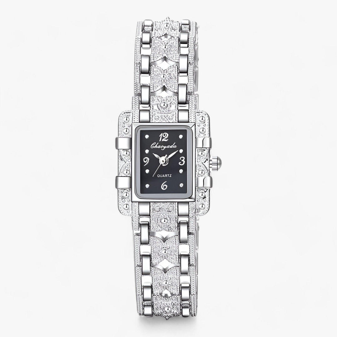 Women's elegant silver rectangular dial watch with sparkling crystal accents.