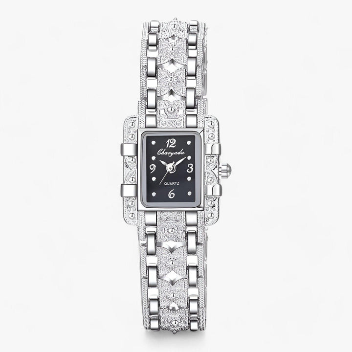 Women's elegant silver rectangular dial watch with sparkling crystal accents.