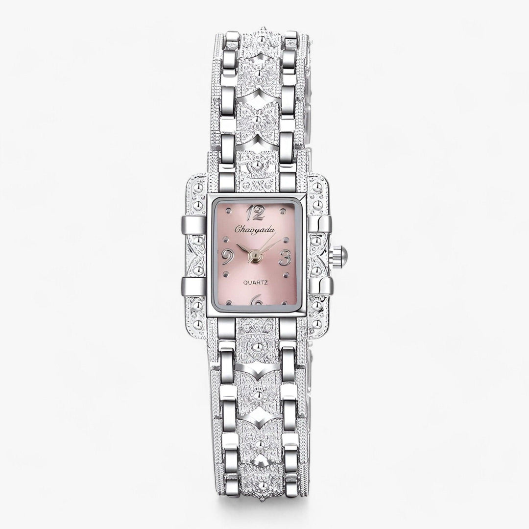 Stylish women's rectangular watch featuring a crystal-embellished bezel and silver finish.
