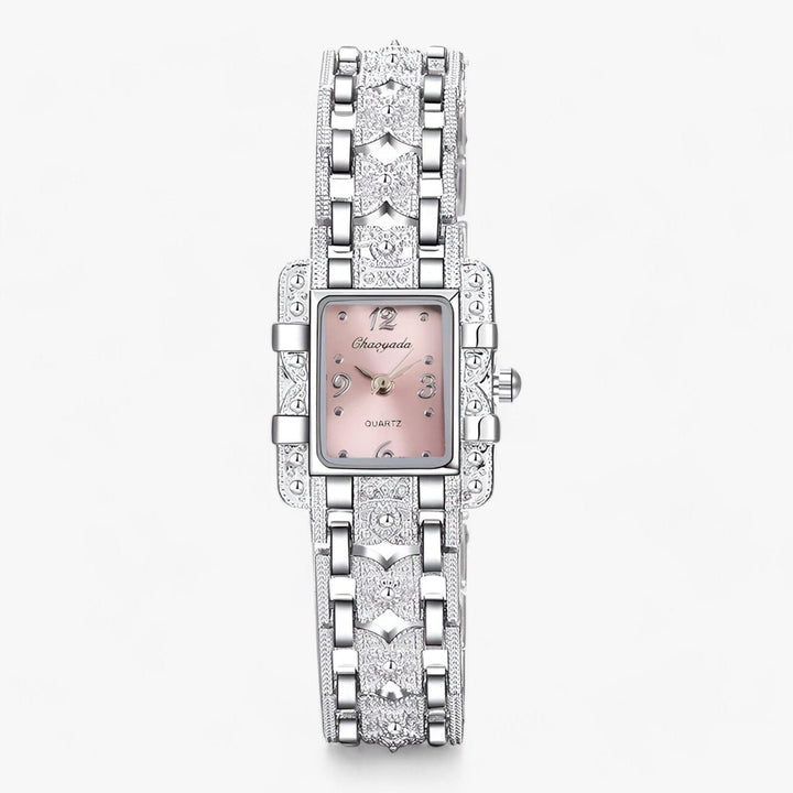 Stylish women's rectangular watch featuring a crystal-embellished bezel and silver finish.