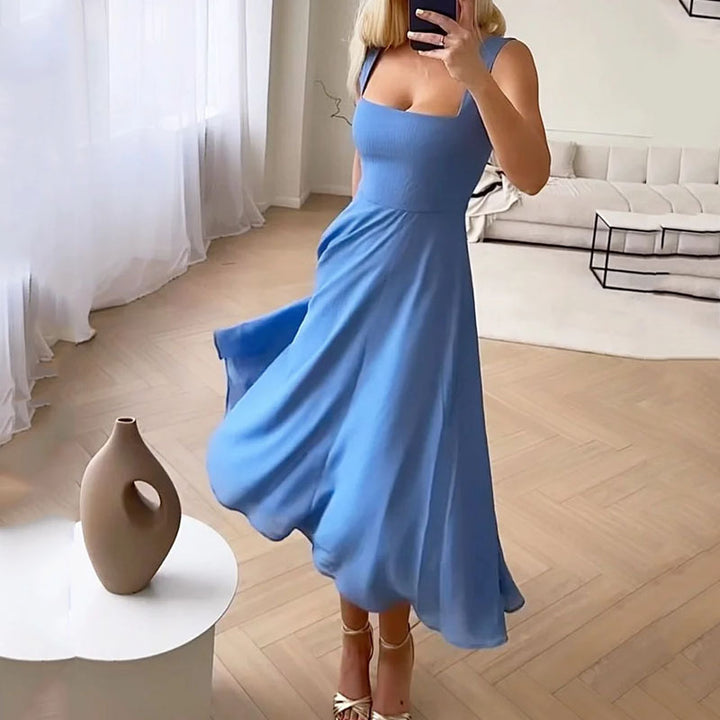 Comfortable solid color sleeveless midi dress for women, offering versatile elegant style for day-to-night or formal wear.