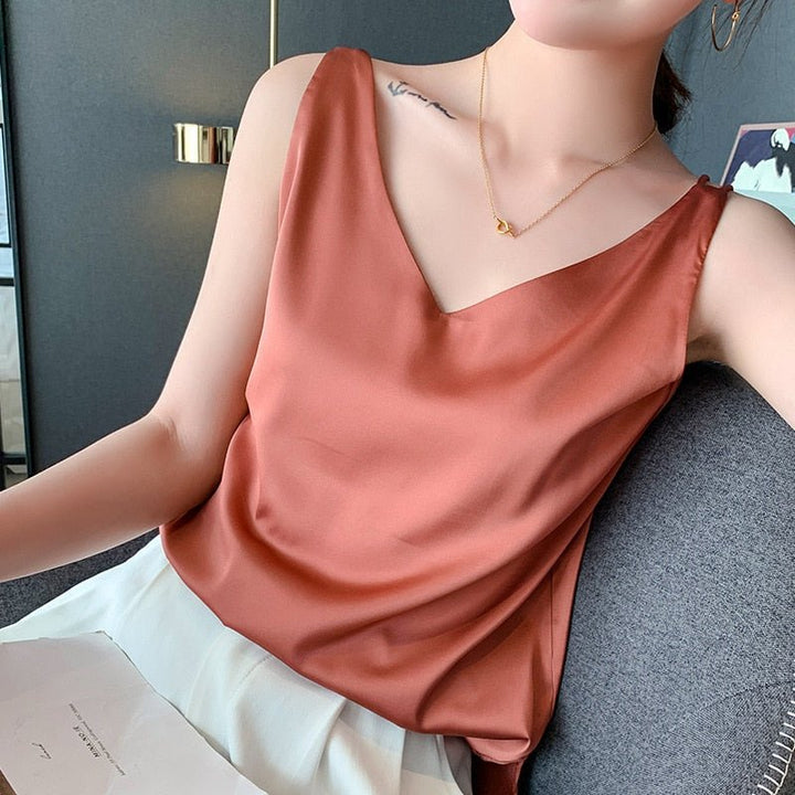 Chic women's sleeveless tank top, an elegant & versatile piece for casual everyday wear.