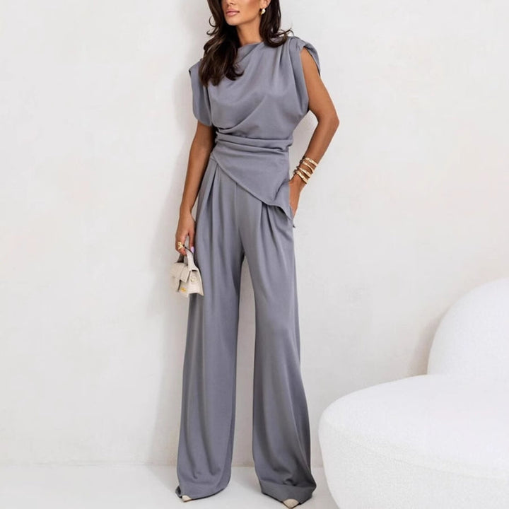Women's elegant sleeveless two-piece top & wide-leg pants set, perfect for summer casual wear.