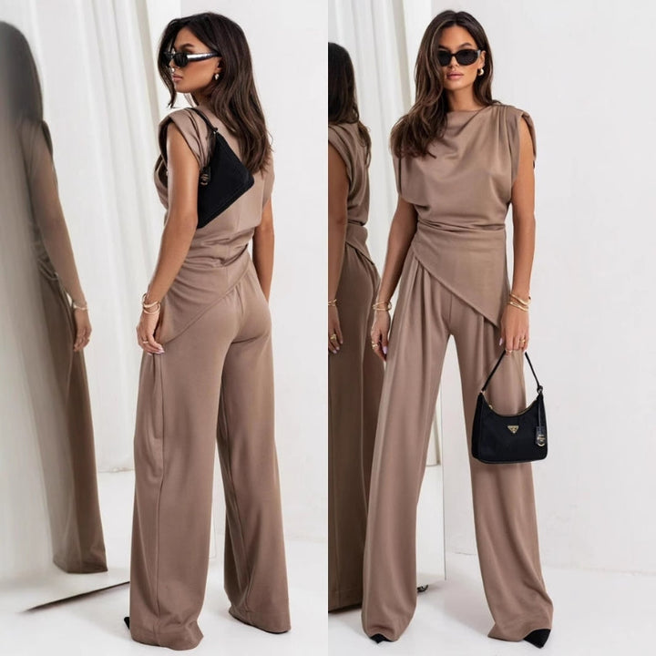 Elegant women's sleeveless two-piece top and pants set for modern summer casual and lounge wear.