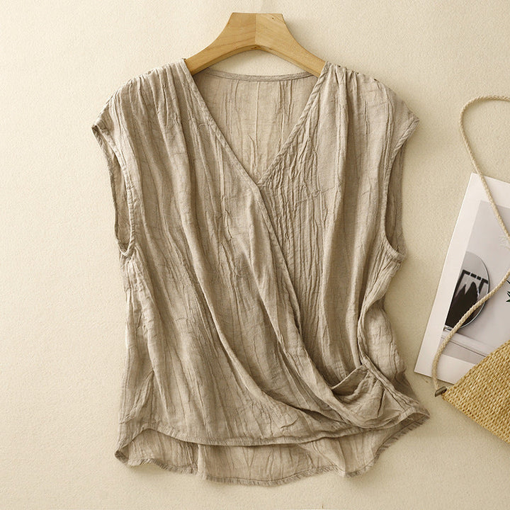 Women's elegant sleeveless wrap top with a relaxed fit, perfect for summer casual or vacation style.