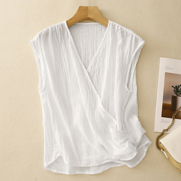 Effortless women's sleeveless wrap top for chic summer casual and elegant everyday style. Relaxed fit.