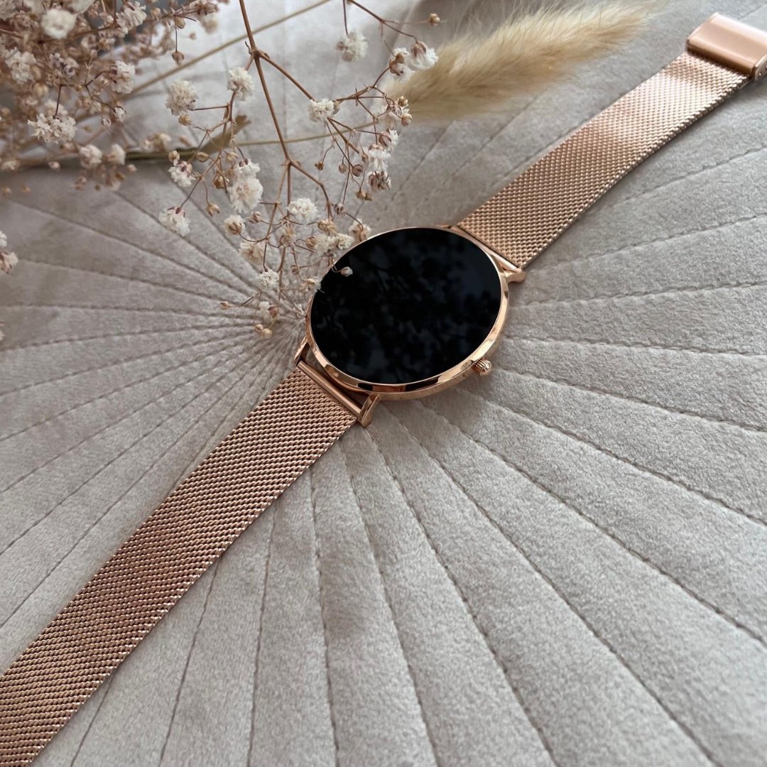 Rose gold women's elegant smartwatch. Sleek stainless steel design, perfect for health tracking & daily wear.