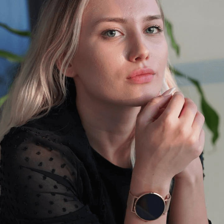 Silver women's elegant smartwatch. A sleek fitness tracker & health monitor with customizable watch faces.