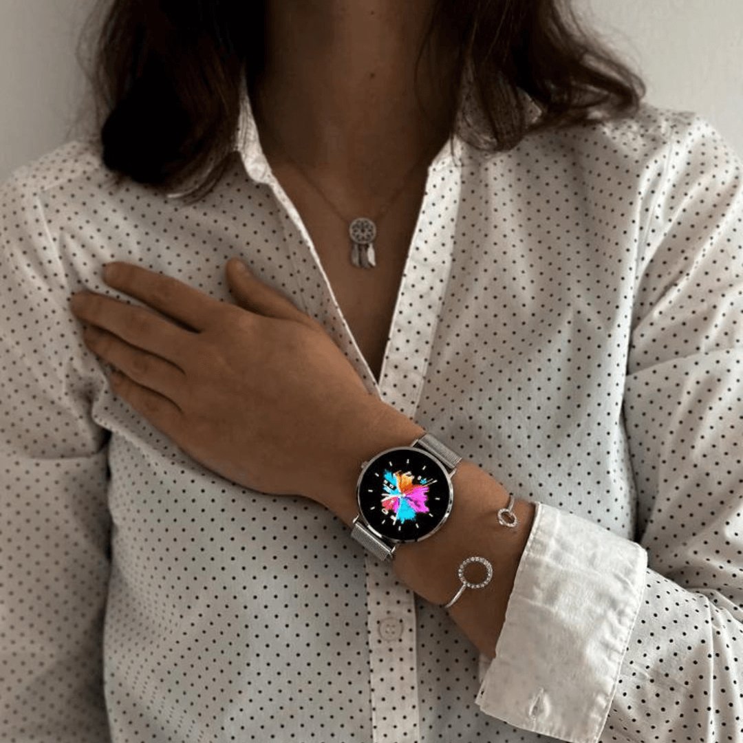 Advanced women's fitness tracker & smartwatch. Monitor workouts, heart rate & activity with a stylish silver band.