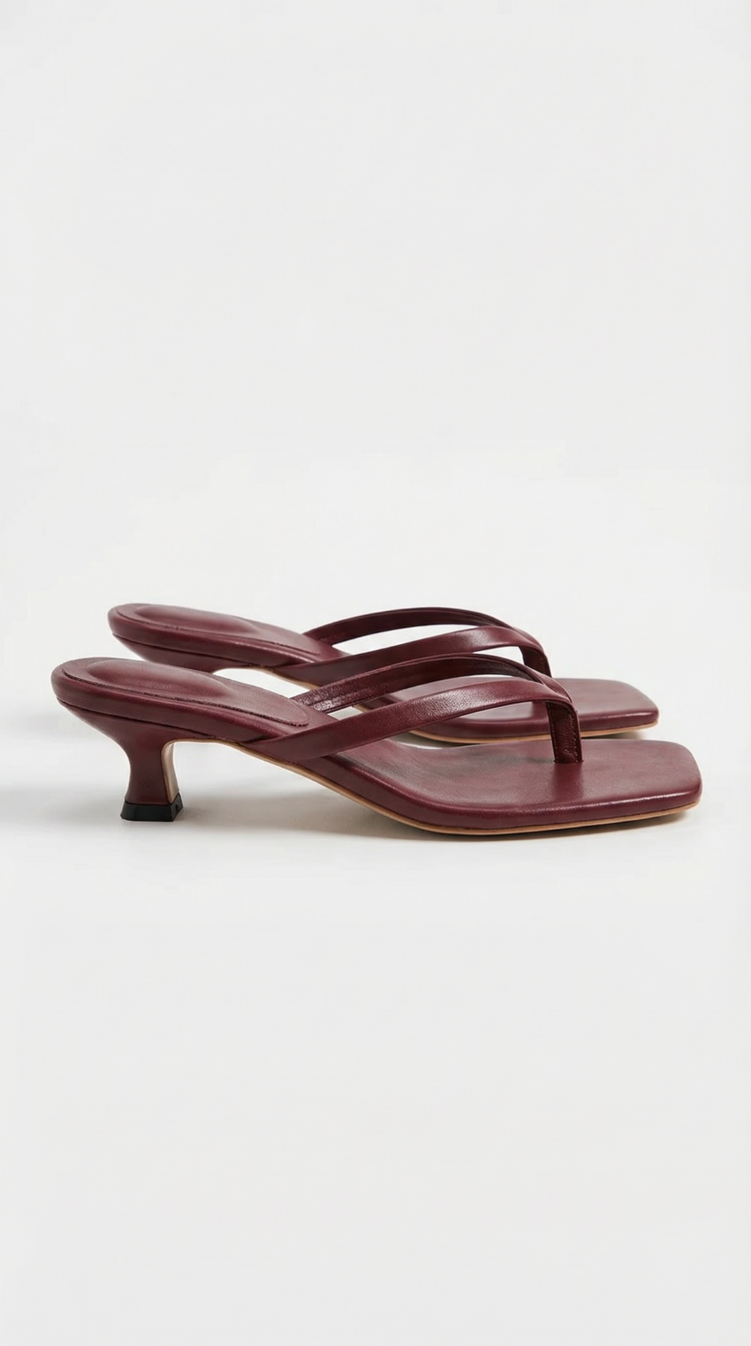 Modern square toe thong kitten heel sandals for women, a stylish choice for any sophisticated outfit.