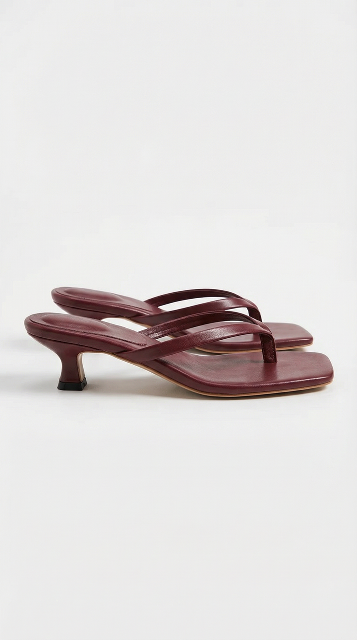 Modern square toe thong kitten heel sandals for women, a stylish choice for any sophisticated outfit.