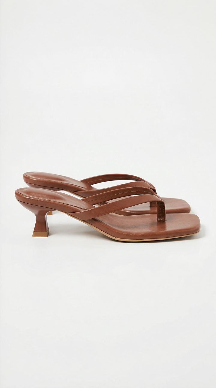 Dressy women's square toe thong sandals, elevated with a comfortable kitten heel for elegant wear.
