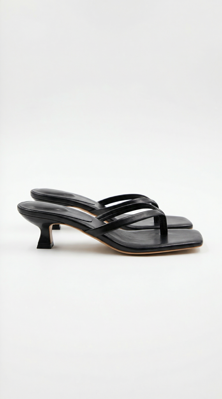 Chic women's dressy square toe thong sandals with a subtle kitten heel. Perfect fashion footwear.