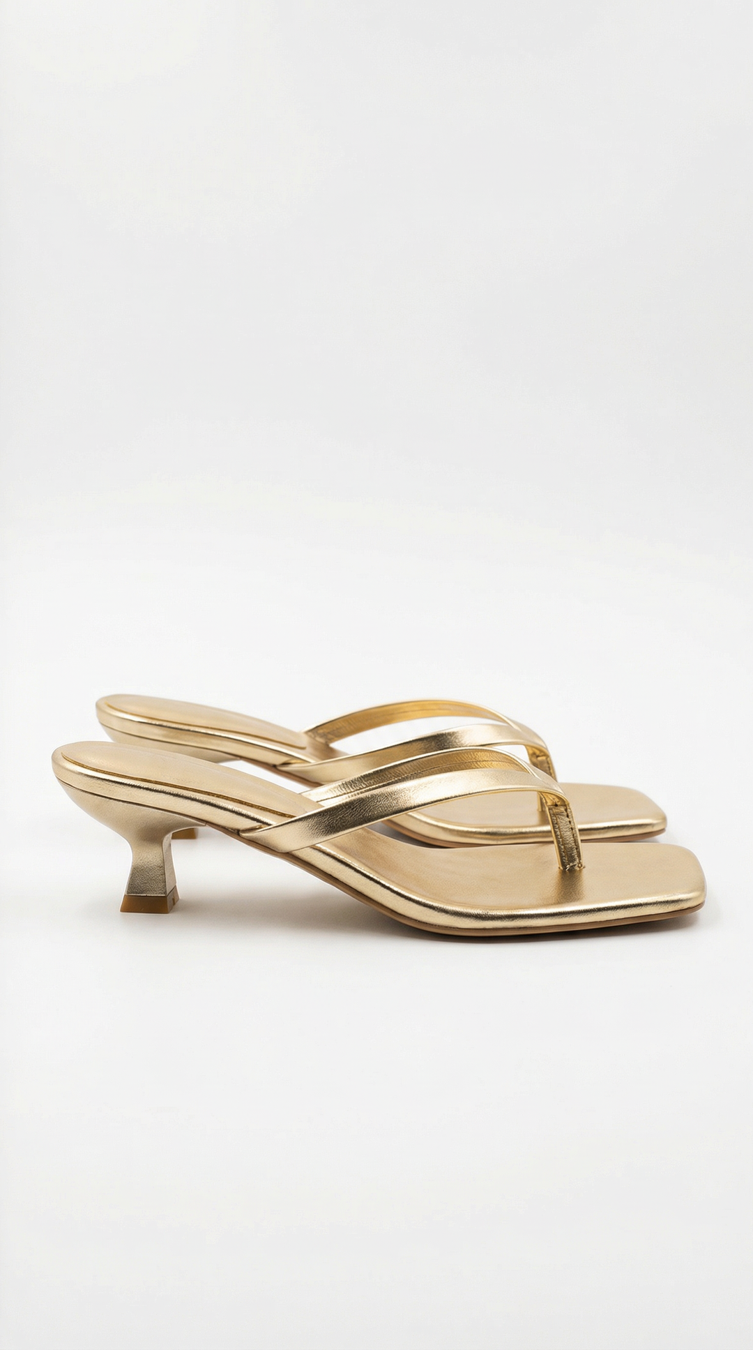 Minimalist women's square toe thong kitten heel sandals, ideal for an upscale and fashionable look.