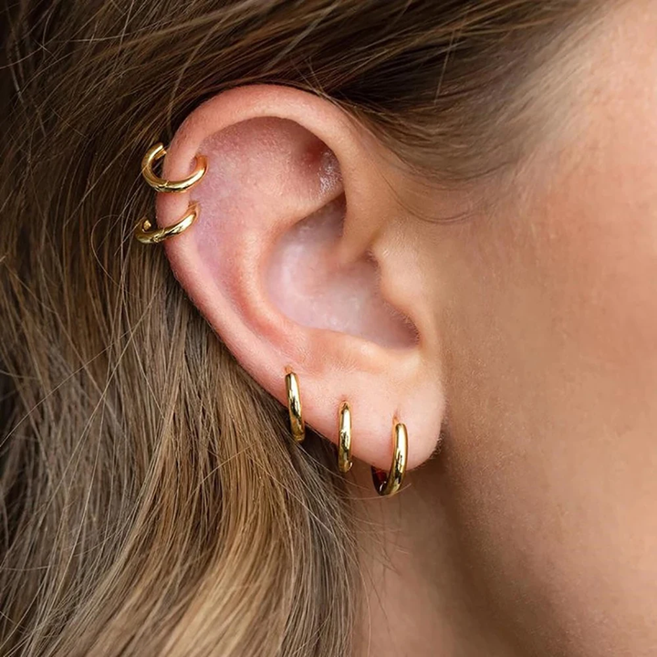 Women's elegant gold hoop earrings, classic hypoallergenic jewelry for her