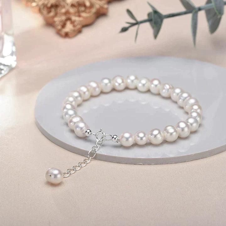 Women's elegant sterling silver freshwater pearl bracelet. Delicate, timeless jewelry, perfect gift.