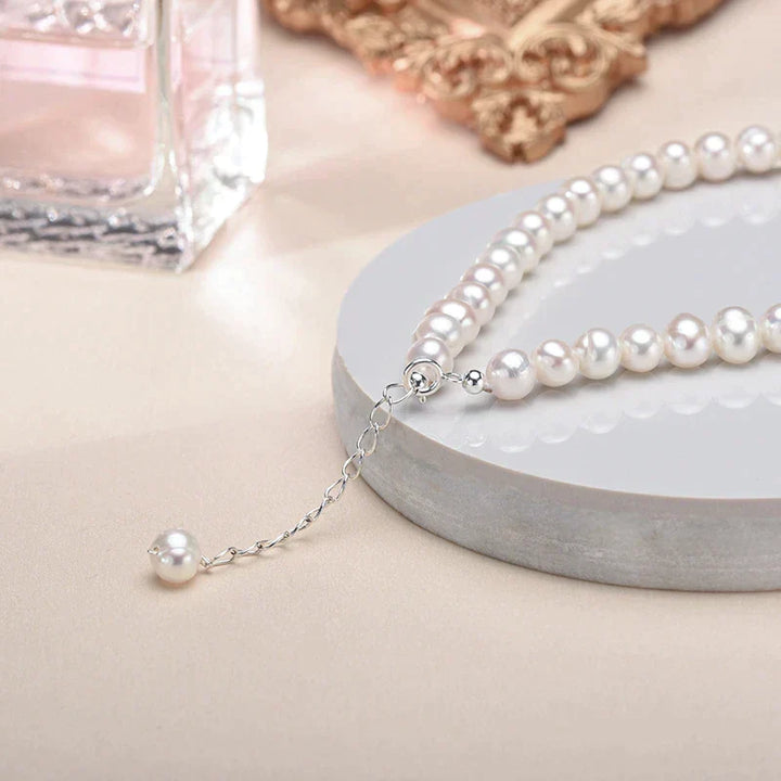 Classic women's silver bracelet with freshwater pearls. Timeless charm, delicate and elegant pearl jewelry.
