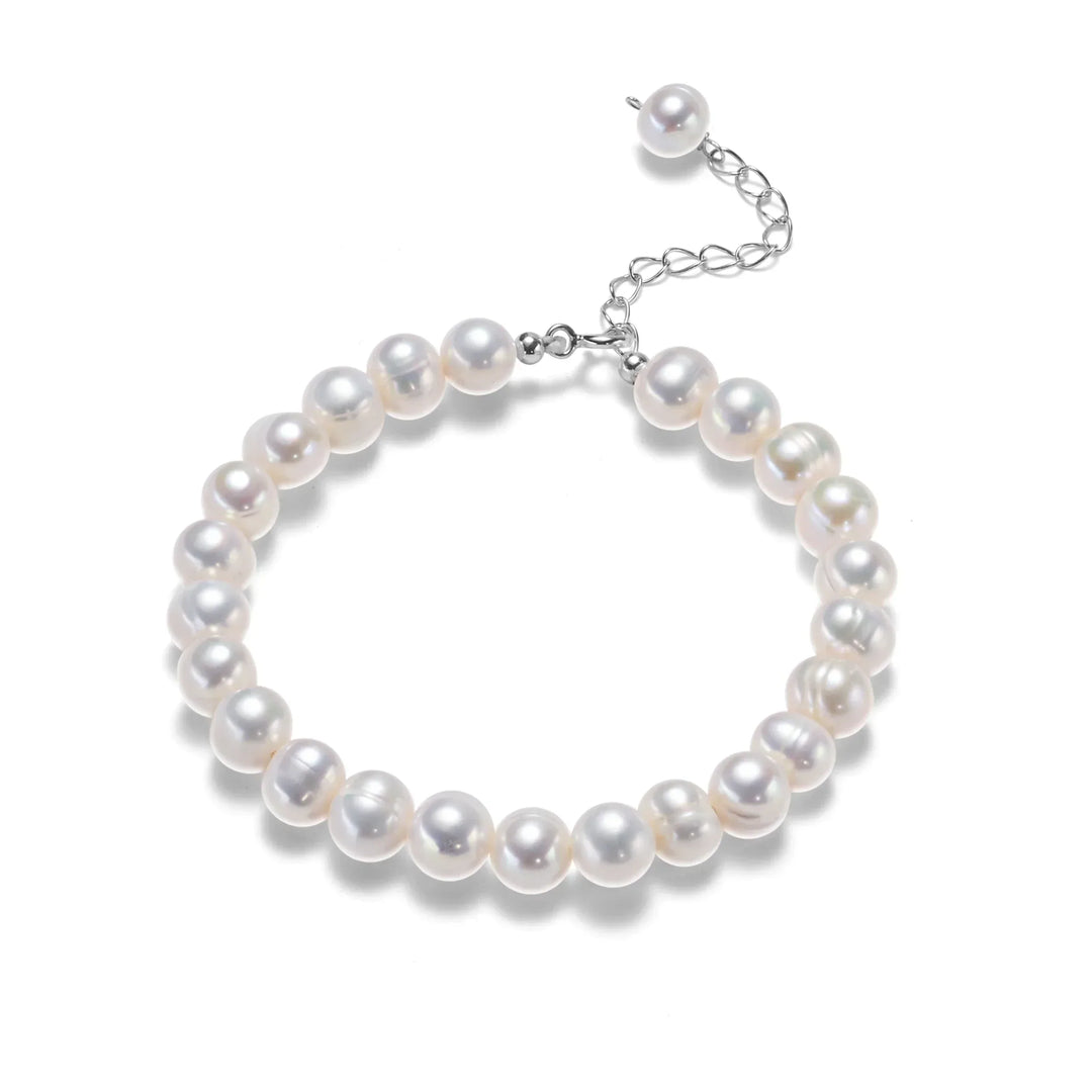 Dainty sterling silver freshwater pearl bracelet for women. Elegant, adjustable, ideal for her.
